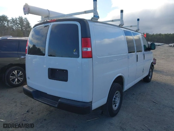 2017 Chevrolet Express Cargo Van with VIN 1GCWGAFF9H1171553, listed as a IAAI auction lot 41005738 with 131,621 mi miles. Bid and sale history available at carsss.com. Image 4.