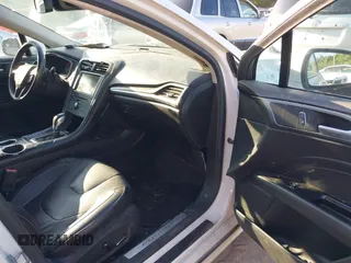 2014 Ford Fusion Titanium with VIN 3FA6P0K95ER128961, listed as a IAAI auction lot 42750668 with 197,188 mi miles and . Bid and sale history available at DreamBid. Image 5.