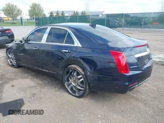 2015 Cadillac CTS Luxury AWD with VIN 1G6AX5SX5F0119102, listed as a IAAI auction lot 42231015 with 106,643 mi miles and . Bid and sale history available at DreamBid. Image 3.