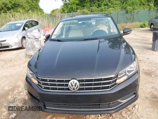 2017 Volkswagen Passat SE with VIN 1VWBT7A39HC032213, listed as a IAAI auction lot 42334358 with 99,277 mi miles and . Bid and sale history available at DreamBid. Image 12.
