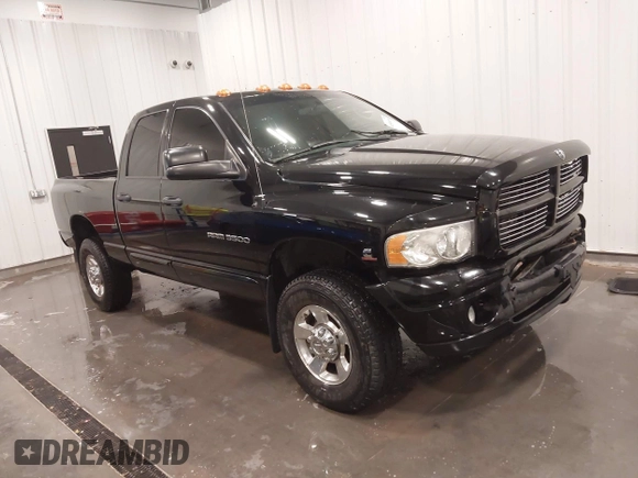 2005 Dodge Ram 3500 SLT with VIN 3D7LS38C85G810265, listed as a IAAI auction lot 41856058 with 164,027 mi miles. Bid and sale history available at carsss.com. Image 1.