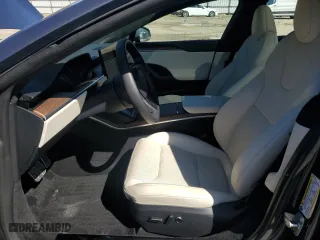 2023 Tesla Model S with VIN 5YJSA1E54PF516907, listed as a Copart auction lot 49372825 with 24,556 mi miles and Salvage Title. Bid and sale history available at carsss.com. Image 7.