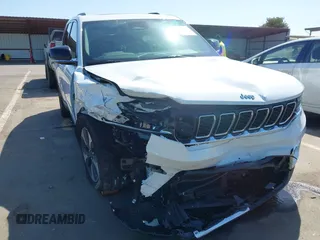 2022 Jeep Grand Cherokee with VIN 1C4RJYB66N8718018, listed as a IAAI auction lot 42002051 with Not provided miles and . Bid and sale history available at DreamBid. Image 6.