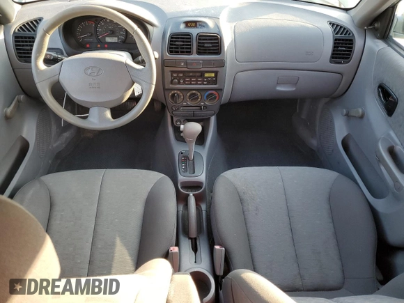 2005 Hyundai Accent GLS with VIN KMHCG45C35U595666, listed as a Copart auction lot 88294365 with 70,497 mi miles and Salvage Title. Bid and sale history available at carsss.com. Image 8.