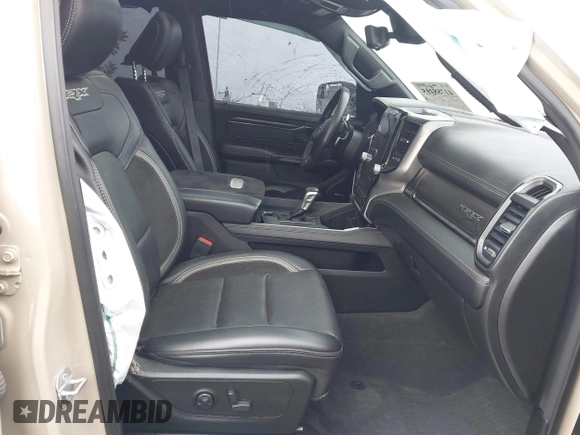 2022 Ram 1500 TRX with VIN 1C6SRFU92NN383774, listed as a IAAI auction lot 41788415 with 34,646 mi miles and . Bid and sale history available at DreamBid. Image 5.