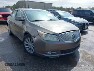 2012 Buick LaCrosse Touring with VIN 1G4GJ5E32CF231104, listed as a IAAI auction lot 41717789 with 134,707 mi miles and . Bid and sale history available at DreamBid. Image 1.