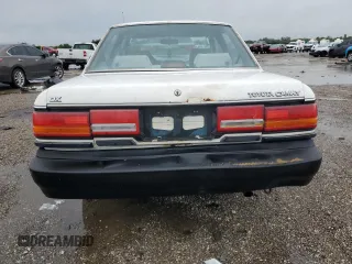 1991 Toyota Camry z VIN JT2SV21E2M3435406, wystawiony jako Copart lot #74958494 z przebiegiem 127 580 mil mil oraz Szkoda całkowita • Salvage title. Historia ofert i sprzedaży dostępna na DreamBid. Obrazek 6.