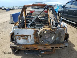 1992 Geo Tracker z VIN 2CNBJ18U5N6929792, wystawiony jako Copart lot #68870474 z przebiegiem Nie podano mil oraz Nie do naprawy. Historia ofert i sprzedaży dostępna na DreamBid. Obrazek 6.