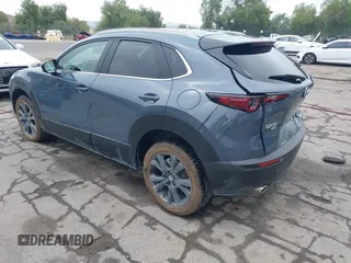 2022 Mazda CX-30 S Carbon Edition with VIN 3MVDMBCL0NM456154, listed as a IAAI auction lot 42153202 with 40,372 mi miles and . Bid and sale history available at DreamBid. Image 3.