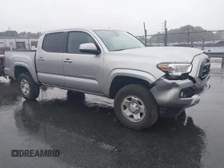 2023 Toyota Tacoma SR with VIN 3TYAX5GN0PT071080, listed as a IAAI auction lot 42426897 with 58,017 mi miles and . Bid and sale history available at DreamBid. Image 1.