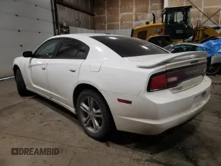 2014 Dodge Charger SXT with VIN 2C3CDXJG2EH232385, listed as a Copart auction lot 46274125 with 112,871 mi miles and Salvage Title. Bid and sale history available at carsss.com. Image 2.