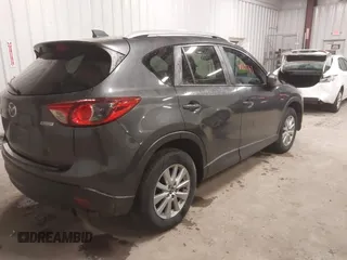 2015 Mazda CX-5 Touring with VIN JM3KE4CY3F0460501, listed as a IAAI auction lot 41889743 with 160,367 mi miles. Bid and sale history available at carsss.com. Image 4.
