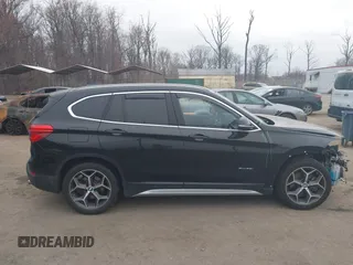 2017 BMW X1 xDrive28i with VIN WBXHT3C31H5F72958, listed as a IAAI auction lot 41782257 with 134,829 mi miles. Bid and sale history available at carsss.com. Image 13.