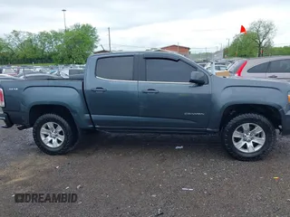 2015 GMC Canyon 4WD SLE with VIN 1GTG6BE3XF1153421, listed as a IAAI auction lot 42079375 with 161,379 mi miles and . Bid and sale history available at carsss.com. Image 13.
