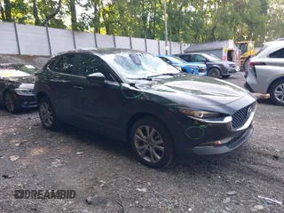 2021 Mazda CX-30 Select z VIN 3MVDMBBL1MM234920, wystawiony jako IAAI lot #42463933 z przebiegiem 26 619 mil mil oraz . Historia ofert i sprzedaży dostępna na DreamBid. Obrazek 1.