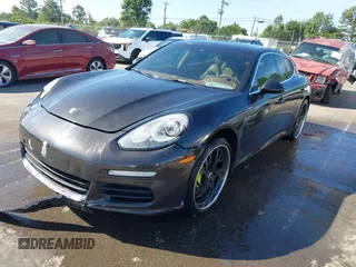 2014 Porsche Panamera S E-Hybrid with VIN WP0AD2A76EL044591, listed as a IAAI auction lot 42436817 with 89,009 mi miles and . Bid and sale history available at DreamBid. Image 18.