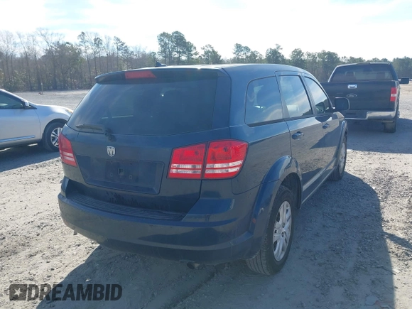 2014 Dodge Journey SE with VIN 3C4PDCABXET277723, listed as a IAAI auction lot 41709752 with 161,587 mi miles and . Bid and sale history available at DreamBid. Image 4.