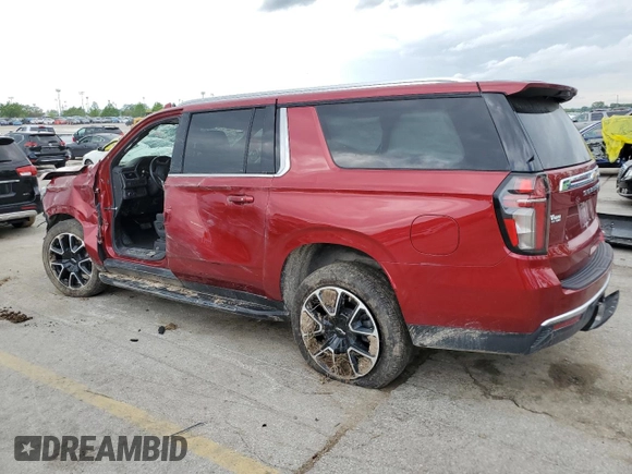 2023 Chevrolet Suburban LS with VIN 1GNSKBKD3PR122105, listed as a Copart auction lot 54889545 with 70,921 mi miles and Salvage title. Bid and sale history available at DreamBid. Image 2.