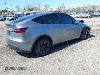 2024 Tesla Model Y Long Range with VIN 7SAYGDEE2RA311261, listed as a IAAI auction lot 41534010 with Not Provided miles and . Bid and sale history available at DreamBid. Image 4.