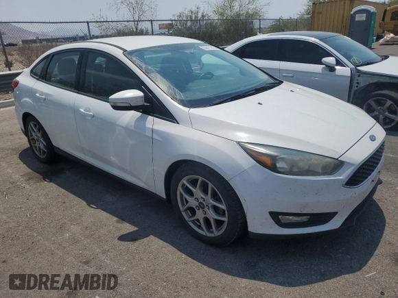 2015 Ford Focus SE with VIN 1FADP3F23FL319168, listed as a Copart auction lot 64411645 with 213,852 mi miles and Clean title. Bid and sale history available at DreamBid. Image 4.