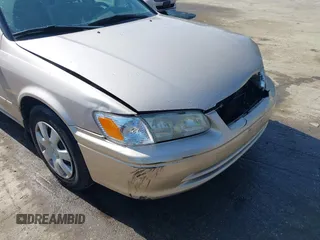 2001 Toyota Camry CE with VIN 4T1BG22K11U114688, listed as a IAAI auction lot 42065715 with 150,181 mi miles. Bid and sale history available at carsss.com. Image 17.