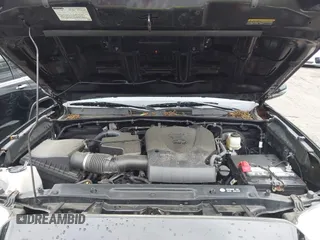 2017 Toyota Tacoma SR5 with VIN 3TMDZ5BN7HM017433, listed as a IAAI auction lot 42303178 with 69,510 mi miles and . Bid and sale history available at DreamBid. Image 10.