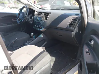 2014 Kia Rio SX with VIN KNADN5A31E6353714, listed as a IAAI auction lot 42127657 with 117,544 mi miles. Bid and sale history available at carsss.com. Image 5.