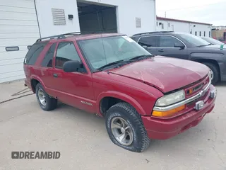 2003 Chevrolet Blazer Xtreme z VIN 1GNCS18X73K114012, wystawiony jako IAAI lot #42283595 z przebiegiem 205 407 mil mil oraz . Historia ofert i sprzedaży dostępna na DreamBid. Obrazek 1.