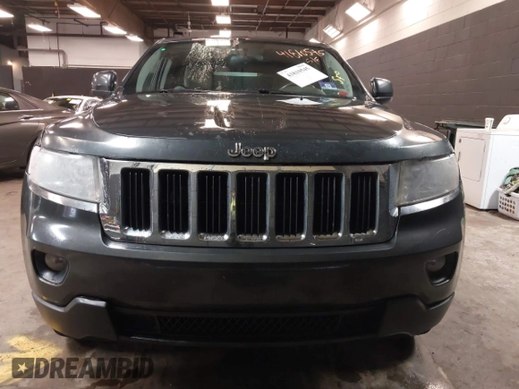 2011 Jeep Grand Cherokee 70th Anniversary with VIN 1J4RR4GG3BC566690, listed as a IAAI auction lot 41810545 with 173,886 mi miles. Bid and sale history available at carsss.com. Image 6.