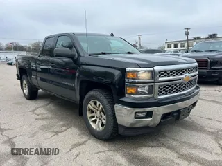 2014 Chevrolet Silverado 1500 LT with VIN 1GCVKREH1EZ169899, listed as a IAAI auction lot 42143501 with 124,789 mi miles and . Bid and sale history available at DreamBid. Image 1.