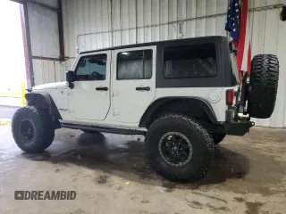 2014 Jeep Wrangler Unlimited Sport with VIN 1C4BJWDG4EL125251, listed as a Copart auction lot 51092675 with 76,867 mi miles and Clean Title. Bid and sale history available at carsss.com. Image 2.