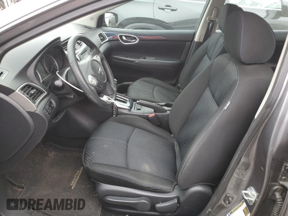 2018 Nissan Sentra S with VIN 3N1AB7AP4JY282981, listed as a Copart auction lot 52480955 with 57,217 mi miles and Salvage Title. Bid and sale history available at DreamBid. Image 7.