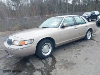 1998 Mercury Grand Marquis LS with VIN 2MEFM75W2WX695255, listed as a IAAI auction lot 41481865 with 177,365 mi miles. Bid and sale history available at carsss.com. Image 2.