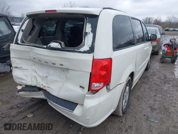 2012 Dodge Grand Caravan SXT with VIN 2C4RDGCG8CR294836, listed as a IAAI auction lot 41995385 with 184,475 mi miles and . Bid and sale history available at DreamBid. Image 4.