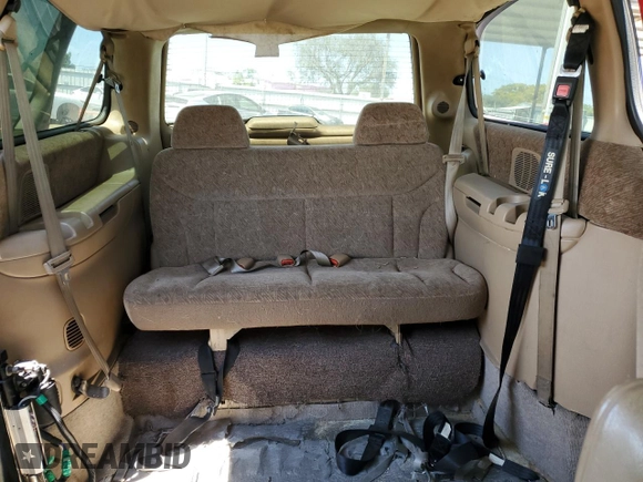 1998 Dodge Caravan z VIN 1B4GP5418WB631553, wystawiony jako Copart lot #65227034 z przebiegiem Nie podano mil oraz Szkoda całkowita • Salvage title. Historia ofert i sprzedaży dostępna na DreamBid. Obrazek 10.