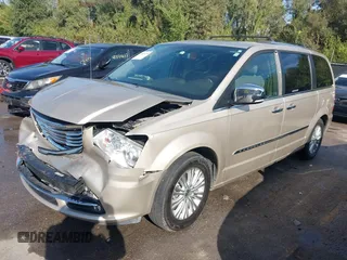 2015 Chrysler Town & Country Limited Platinum with VIN 2C4RC1GGXFR619209, listed as a IAAI auction lot 40366234 with 163,649 mi miles. Bid and sale history available at carsss.com. Image 18.
