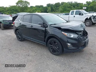 2020 Chevrolet Equinox LT with VIN 2GNAXUEV0L6107063, listed as a IAAI auction lot 42351557 with 69,663 mi miles and . Bid and sale history available at DreamBid. Image 1.