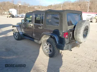 2017 Jeep Wrangler Unlimited Sahara with VIN 1C4BJWEG9HL507908, listed as a IAAI auction lot 41880209 with 99,773 mi miles. Bid and sale history available at carsss.com. Image 3.