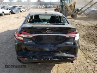 2018 Ford Fusion Hybrid Titanium with VIN 3FA6P0RU5JR120394, listed as a Copart auction lot 73557602 with 148,870 mi miles. Bid and sale history available at carsss.com. Image 6.