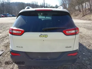2015 Jeep Cherokee Latitude with VIN 1C4PJMCS7FW503594, listed as a IAAI auction lot 41792820 with 77,325 mi miles. Bid and sale history available at carsss.com. Image 16.