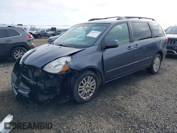 2008 Toyota Sienna XLE with VIN 5TDBK22C98S017300, listed as a IAAI auction lot 41433777 with 248,602 mi miles. Bid and sale history available at carsss.com. Image 17.