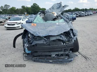 2023 Toyota Corolla Cross LE with VIN 7MUCAABG8PV066528, listed as a Copart auction lot 58902095 with 14,190 mi miles and Salvage title. Bid and sale history available at DreamBid. Image 5.
