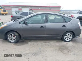 2007 Toyota Prius z VIN JTDKB20U473285795, wystawiony jako IAAI lot #42280703 z przebiegiem Nie podano mil oraz . Historia ofert i sprzedaży dostępna na DreamBid. Obrazek 12.