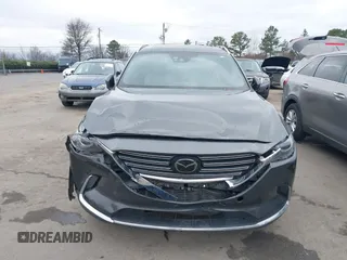 2016 Mazda CX-9 Grand Touring with VIN JM3TCADY4G0111310, listed as a IAAI auction lot 41532851 with 178,907 mi miles and . Bid and sale history available at DreamBid. Image 6.