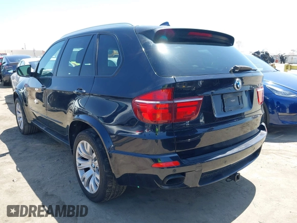 2013 BMW X5 xDrive50i with VIN 5UXZV8C5XD0C15908, listed as a IAAI auction lot 42536233 with 190,627 mi miles and . Bid and sale history available at DreamBid. Image 3.