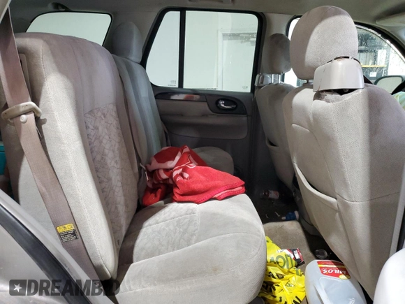 2005 GMC Envoy SLE с VIN 1GKDS13S752274178, выставлен на аукционе Copart как лот 55289005 с пробегом 199 378 миль миль и Списание • Salvage title. История ставок и продаж доступна на DreamBid. Изображение 11.