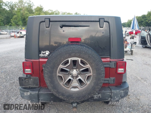 2008 Jeep Wrangler Unlimited X z VIN 1J4GA39128L568988, wystawiony jako IAAI lot #42445403 z przebiegiem 198 032 mil mil oraz . Historia ofert i sprzedaży dostępna na DreamBid. Obrazek 16.