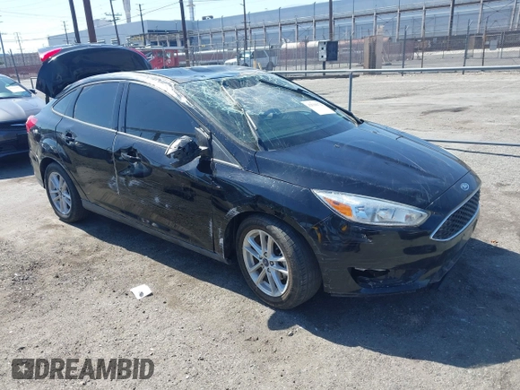 2018 Ford Focus SE z VIN 1FADP3FE9JL303933, wystawiony jako IAAI lot #42530171 z przebiegiem Nie podano mil oraz . Historia ofert i sprzedaży dostępna na DreamBid. Obrazek 1.