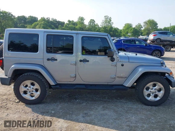2015 Jeep Wrangler Unlimited Sahara with VIN 1C4BJWEG9FL570780, listed as a IAAI auction lot 42474940 with 116,226 mi miles and . Bid and sale history available at DreamBid. Image 14.