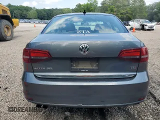 2017 Volkswagen Jetta SEL z VIN 3VWL17AJ9HM407735, wystawiony jako Copart lot #60257715 z przebiegiem 124 393 mil mil oraz Czysty tytuł • Clean title. Historia ofert i sprzedaży dostępna na DreamBid. Obrazek 6.